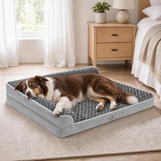 Grey Aeroluxe orthopedic dog bed with headrest bolster and a large dog sleeping on it in a bedroom