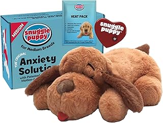 Snuggle Puppy plush brown puppy toy with a real-feel heartbeat and heat pack next to its retail box